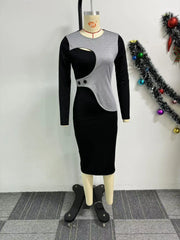 A long-sleeve black midi dress featuring a grey asymmetrical patchwork overlay and button accents.