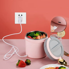A pink USB-powered electric lunch box with a stainless steel interior and a matching lid.