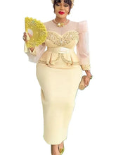 Elegant African long dress for women featuring vibrant Ankara dashiki fabric, perfect for weddings and special occasions.