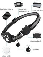 A black cat collar with a reflective strap, breakaway buckle, bell, and an AirTag holder.