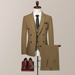 A tan double-breasted suit set including a vest, trousers, and a white shirt with a black tie.