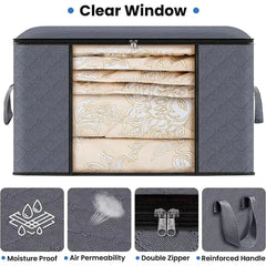 A grey foldable storage box with a clear front window, double zippers, and reinforced handles.