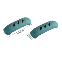 Two teal silicone kitchen handle covers with three oval cutouts, measuring 7.5cm by 2cm.