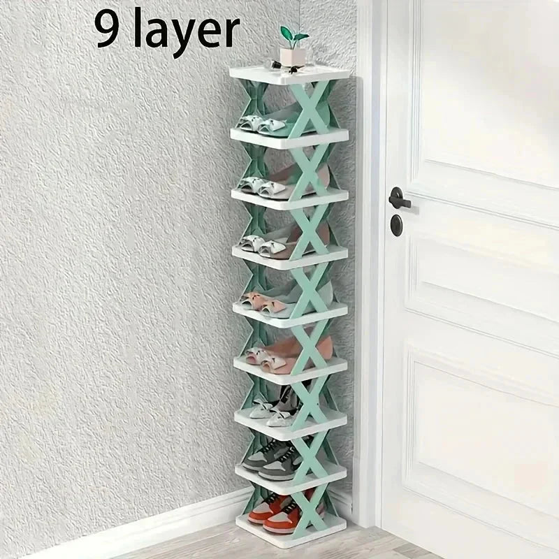 A tall, nine-layer vertical shoe rack with white shelves and green X-shaped supports.