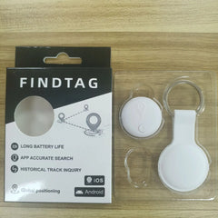 A white Findtag Bluetooth tracker with a matching keychain case in its retail packaging.