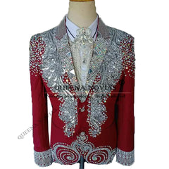 A red men's tuxedo jacket featuring heavy silver crystal and pearl embellishments on the lapels.