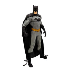 A Batman action figure from the Justice League series standing in a grey and black suit.