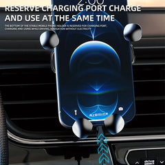 A black gravity car phone holder mounted on an air vent with a smartphone charging.