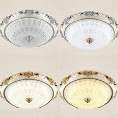 Four round LED ceiling lights with ornate frames and patterned glass shades in various finishes.