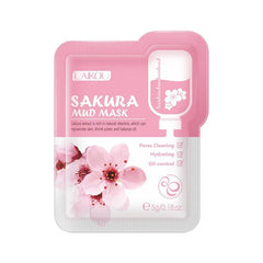 A single-use packet of Laikou Sakura mud mask featuring a pink design with a cherry blossom image.