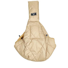 A beige quilted sling carrier for small pets featuring a front pocket and a wide shoulder strap.