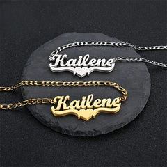 Two personalized stainless steel nameplate necklaces with the name Kailene, one silver and one gold.
