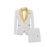 A white jacquard men's suit featuring a gold shawl lapel, matching bow tie, and trousers.