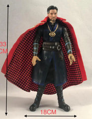 A 33cm Doctor Strange action figure with a fabric cape and articulated joints.