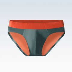 Men's low-waist seamless briefs in dark grey with a contrasting orange waistband and leg trim.