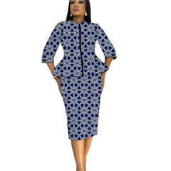 A woman wears a blue and white patterned peplum top and matching pencil skirt.