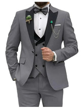 A grey slim-fit three-piece tuxedo suit featuring a black peak lapel, vest, and bow tie.