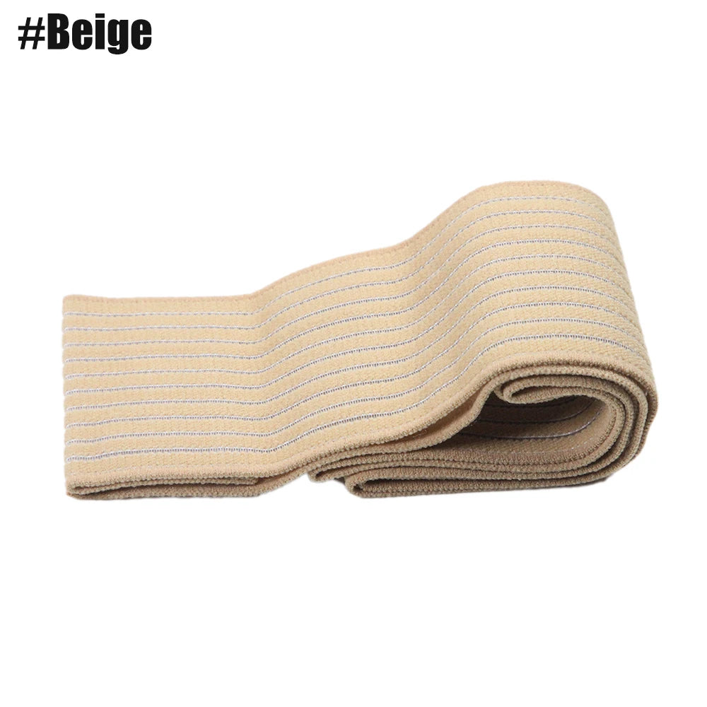A beige elastic compression bandage is folded into a stack.
