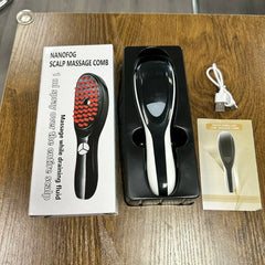 A black and white hair growth laser comb with a charging cable and manual in its packaging.