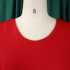 A close-up view of the round neckline on a solid red sheath dress worn on a mannequin.