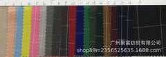 A swatch card displaying nineteen different colors of plaid fabric for men's suits.