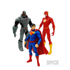 Three Justice League action figures including Cyborg, Superman, and The Flash.
