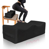 A black rectangular memory foam cushion with a contoured surface for post-surgery support.