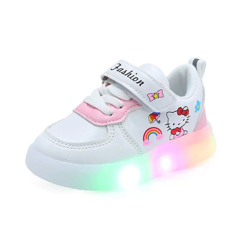 White Hello Kitty sneakers for girls with a hook and loop strap and light-up soles.