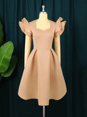 A beige knee-length A-line dress with a sweetheart neckline and ruffled flying sleeves.