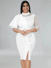 A white midi sheath dress with a beaded mesh neckline, butterfly sleeve, and ruffled front slit.
