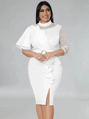A white midi sheath dress with a beaded mesh neckline, butterfly sleeve, and ruffled front slit.