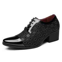 A black men's dress shoe with a pointed toe, patent leather accents, and a checkered pattern.
