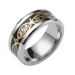 A silver-toned stainless steel ring featuring a black inlay with gold Jesus and fish motifs.