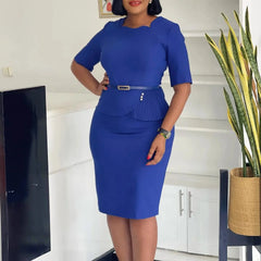 A woman wears a royal blue midi sheath dress with a square neckline, half sleeves, and a belt.