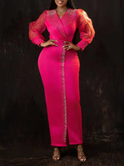 A fuchsia ankle-length sheath dress with a V-neck, beaded accents, and sheer lantern sleeves.