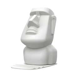 A white plastic Moai statue figurine designed to hold glasses or a phone on a desktop.