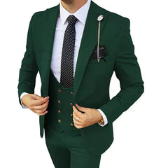 A man wears a dark green three-piece slim-fit suit with a white shirt and polka-dot tie.
