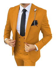 A man wears a mustard yellow three-piece slim fit suit with a white shirt and polka dot tie.