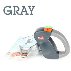A gray dual retractable dog leash with two color-coded buttons and reflective leads.