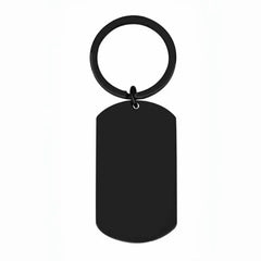 A matte black rectangular dog tag keychain with a matching circular split ring.