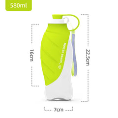 A lime green and clear portable pet water bottle with a leaf-shaped drinking cup attachment.