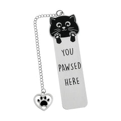 A silver stainless steel bookmark featuring a black cat design and the text You Pawsed Here.