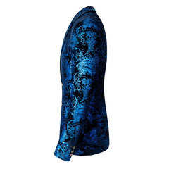 A side view of a slim-fit men's suit jacket in a vibrant blue and black floral brocade pattern.