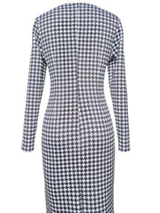 Back view of a slim-fit, long-sleeve midi dress featuring a black and white houndstooth pattern.