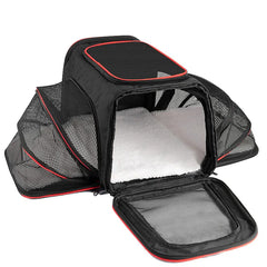 A black, foldable pet carrier with expandable mesh sides and a soft white interior mat.