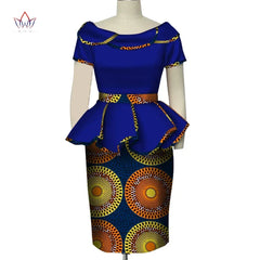A blue two-piece set featuring a short-sleeved peplum top and a patterned midi skirt.