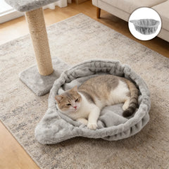A plush grey cat bed attachment for a cat tree with a cat resting inside.