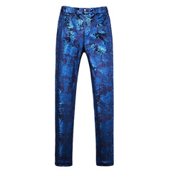 A pair of slim-fit men's dress trousers in a vibrant blue fabric featuring an intricate floral pattern.