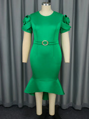 A green midi dress with short sleeves featuring three-dimensional rose details and a belted waist.