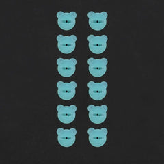 Twelve light blue plastic bear-shaped fasteners arranged in two vertical columns.